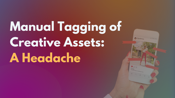 Manual Tagging of Creative Assets: A Headache. Person holding a phone with a social media post